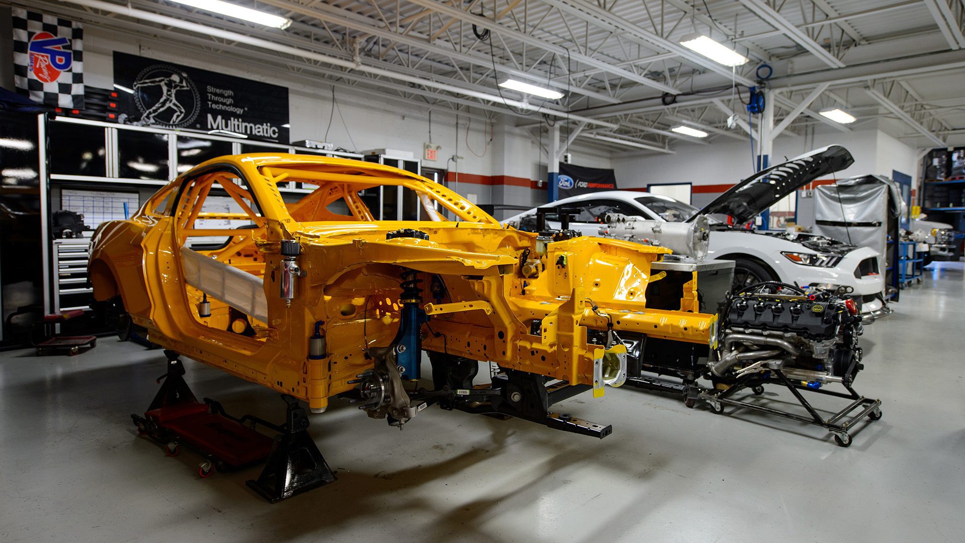 Race cars being built